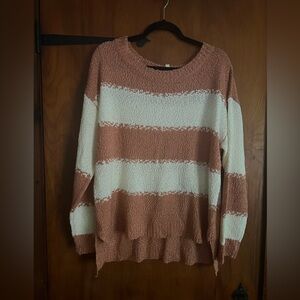 Sweater by 143 Story peachy and white in color